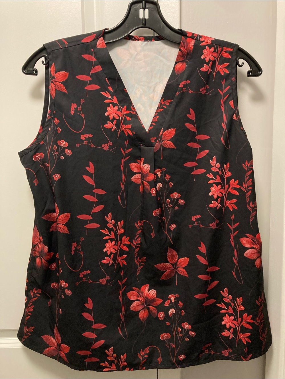 Sleeveless Black Top with Red Floral Print